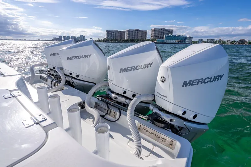  Yacht Photos Pics Freeman 37 boat with three Mercury engines on a sunny day, 2021 model.
