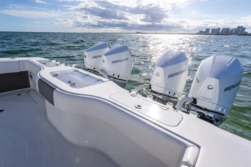  Yacht Photos Pics Freeman 37 boat with triple Mercury engines on open water, 2021 model.