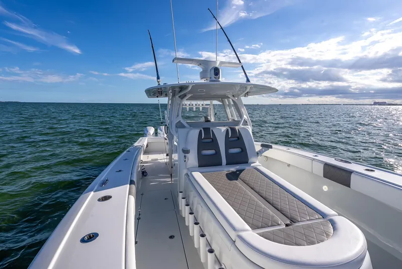  Yacht Photos Pics Freeman 37 boat, 2021 model, cruising on open water under a clear blue sky.