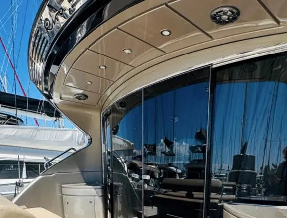  Yacht Photos Pics Luxury yacht Riva 68 Ego, 2006 model, with sleek design and reflective glass.