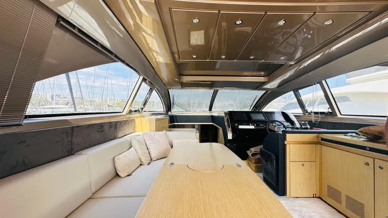  Yacht Photos Pics Luxurious interior of a 2006 Riva 68 Ego yacht with modern design and spacious seating.