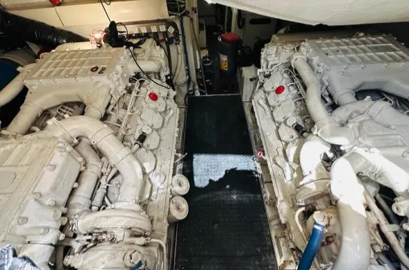  Yacht Photos Pics Engine room of a 2006 Riva 68 Ego yacht, showcasing dual powerful engines.