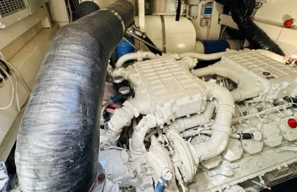  Yacht Photos Pics Engine room of a 2006 Riva 68 Ego yacht, showcasing complex machinery and components.