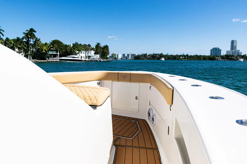  Yacht Photos Pics 2016 SeaVee 430 boat deck with scenic waterfront view and city skyline.
