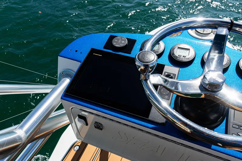  Yacht Photos Pics Steering console of 2016 SeaVee 430 boat with modern navigation equipment.