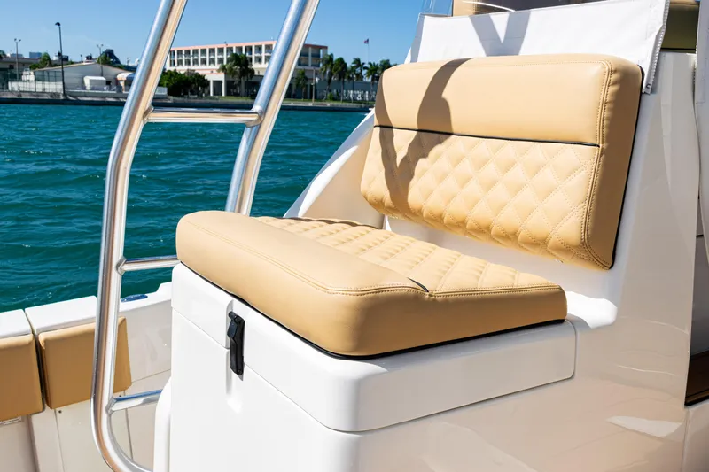  Yacht Photos Pics Luxurious seating on a 2016 SeaVee 430 boat with quilted tan cushions.