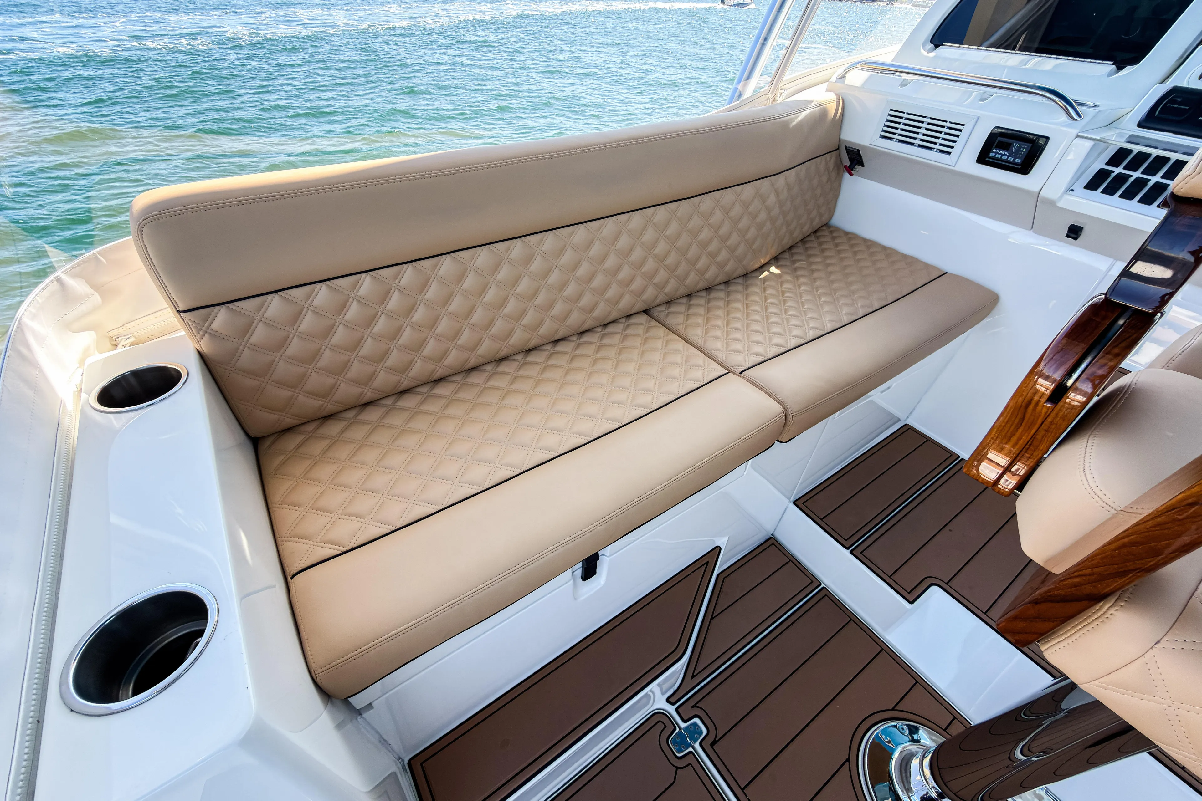  Yacht Photos Pics Luxurious seating on 2016 SeaVee 430 boat with quilted upholstery and ocean view.