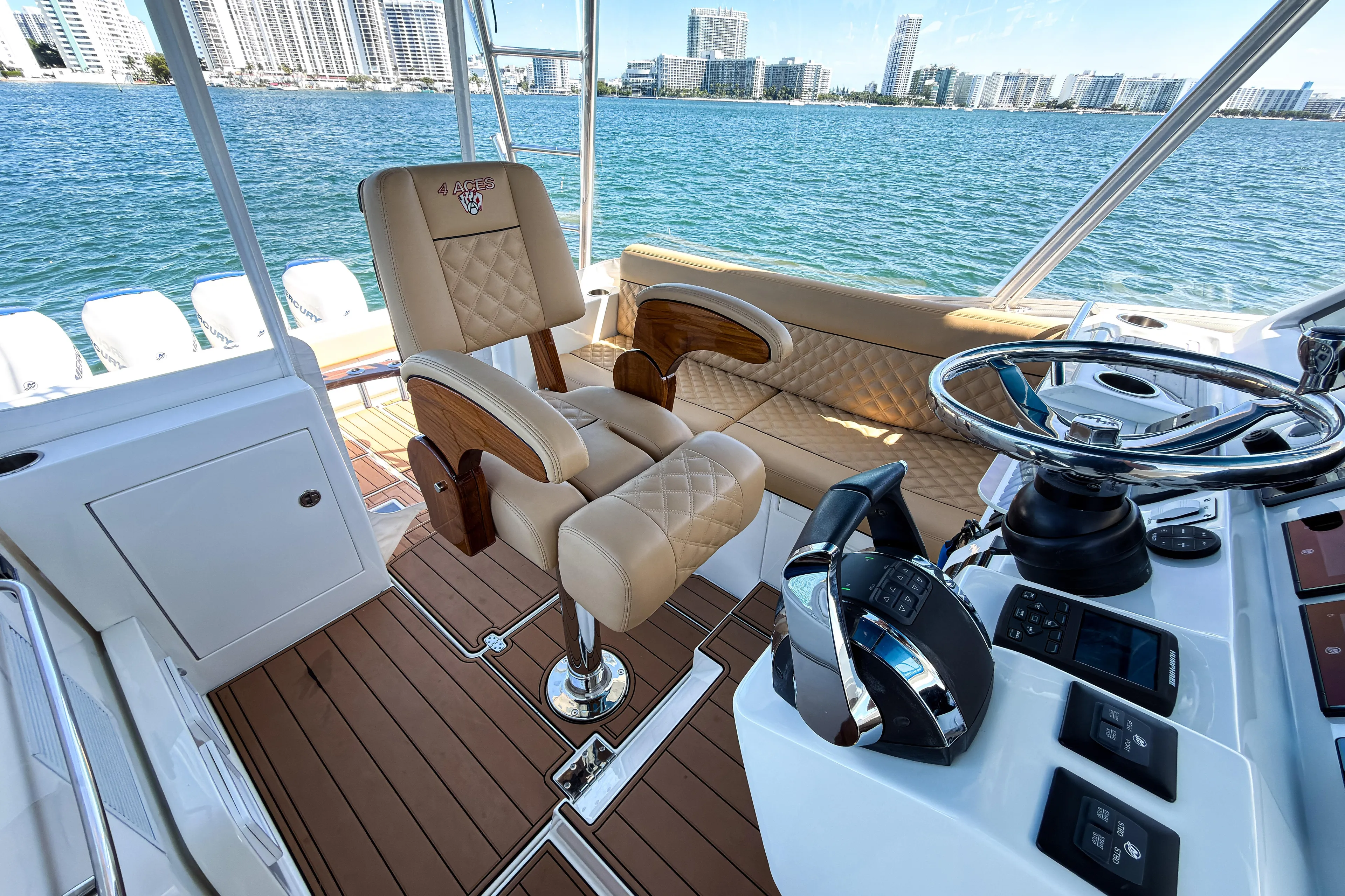  Yacht Photos Pics Luxurious 2016 SeaVee 430 yacht interior with plush seating and modern controls.