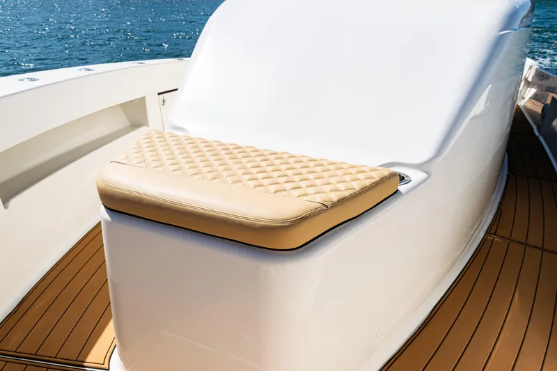  Yacht Photos Pics Luxurious seating on 2016 SeaVee 430 boat with quilted cushion and teak deck.