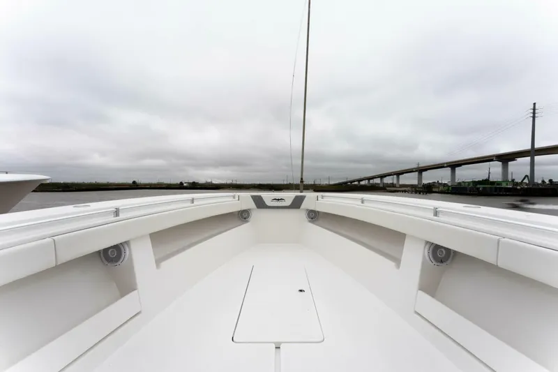  Yacht Photos Pics 2019 Invincible 39 Open Fisherman boat deck with overcast sky and bridge in background.