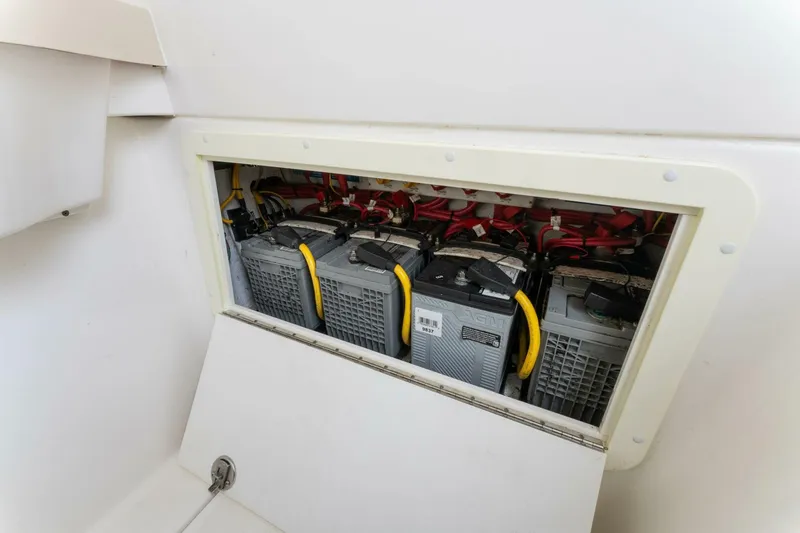  Yacht Photos Pics Battery compartment of 2019 Invincible 39 Open Fisherman boat, showcasing multiple batteries.