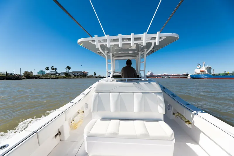  Yacht Photos Pics 2019 Invincible 39 Open Fisherman boat cruising on a sunny day.
