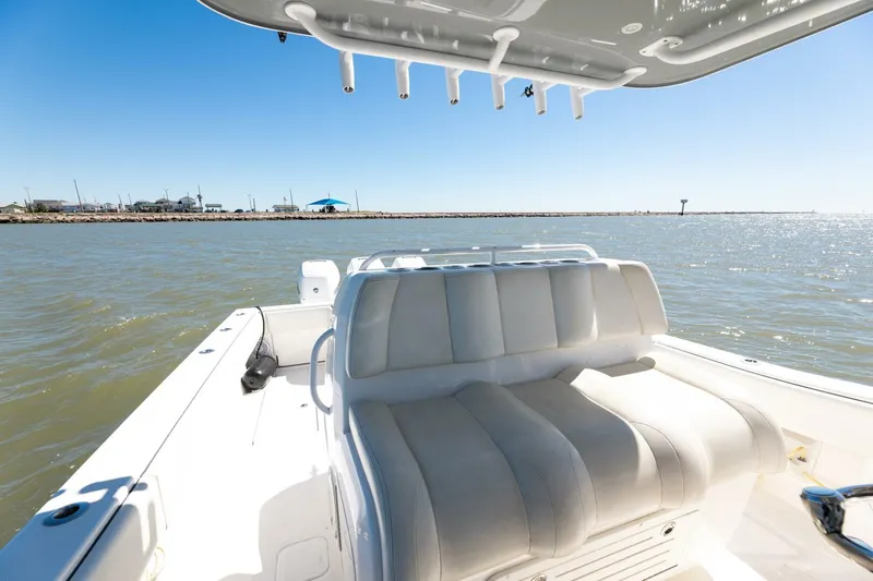  Yacht Photos Pics 2019 Invincible 39 Open Fisherman boat interior with seating, ocean view, and rod holders.