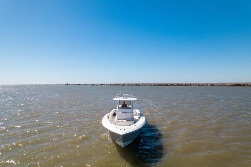  Yacht Photos Pics 2019 Invincible 39 Open Fisherman boat on open water under clear blue sky.