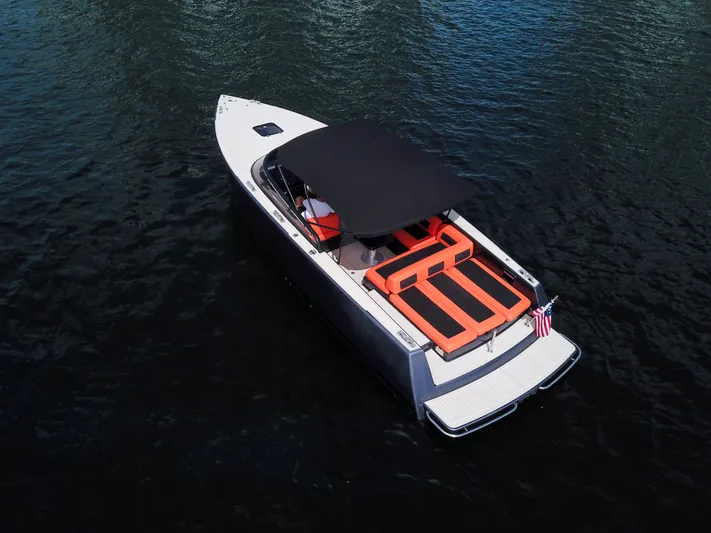  Yacht Photos Pics VanDutch 30 yacht, 2016 model, with sleek design and orange seating, cruising on water.
