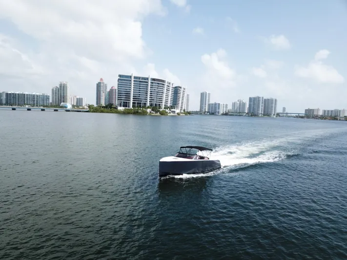  Yacht Photos Pics VanDutch 30 yacht cruising near modern city skyline, 2016 model.