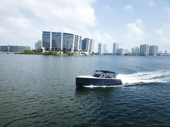  Yacht Photos Pics VanDutch 30 yacht cruising near modern city skyline, 2016 model.