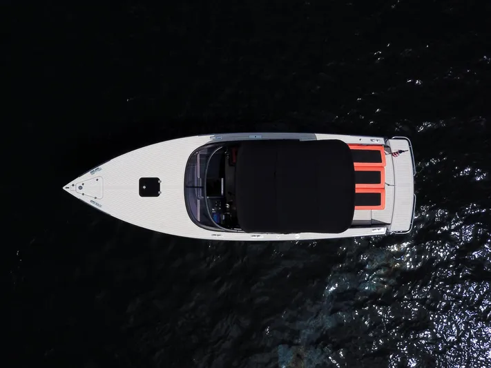  Yacht Photos Pics Aerial view of 2016 VanDutch 30 yacht on dark water.