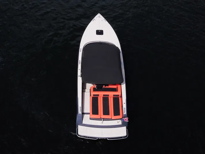  Yacht Photos Pics Aerial view of 2016 VanDutch 30 boat with black and orange seating.