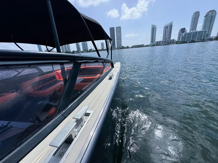  Yacht Photos Pics VanDutch 30 yacht cruising near city skyline, 2016 model, sunny day on the water.