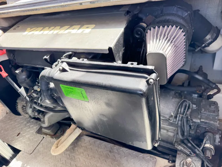  Yacht Photos Pics Yanmar engine in a 2016 VanDutch 30 boat, showcasing mechanical components and air filter.