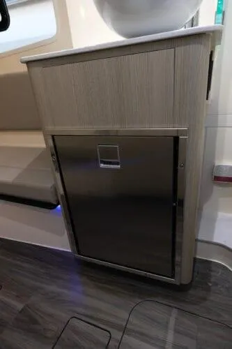  Yacht Photos Pics 2026 Scout 357 LXF interior with modern cabinetry and stainless steel accents.