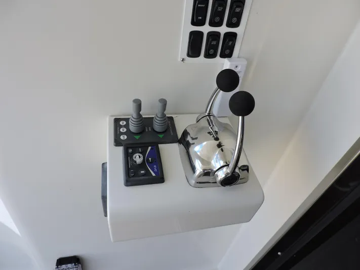  Yacht Photos Pics Control panel of 2010 Carver 56 Voyager SE yacht with levers and switches.