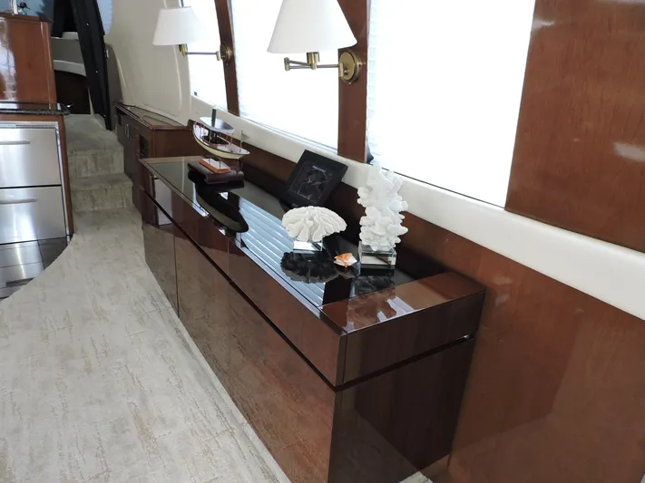  Yacht Photos Pics Luxurious interior of 2010 Carver 56 Voyager SE yacht with elegant wooden cabinetry.