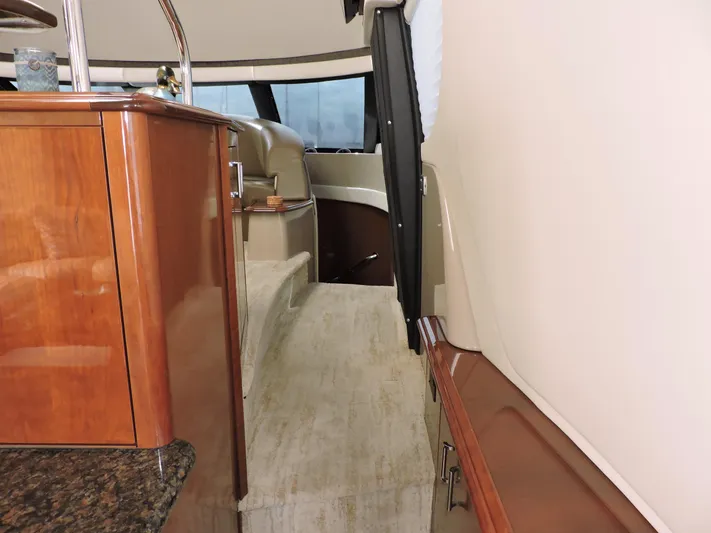  Yacht Photos Pics Interior of 2010 Carver 56 Voyager SE yacht with elegant wood finishes.