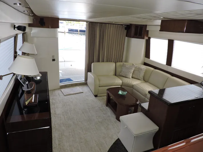  Yacht Photos Pics Luxurious interior of 2010 Carver 56 Voyager SE yacht with elegant seating and decor.