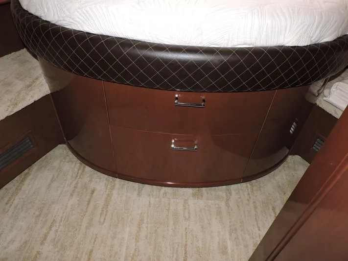  Yacht Photos Pics Luxurious interior of 2010 Carver 56 Voyager SE with elegant wood cabinetry.