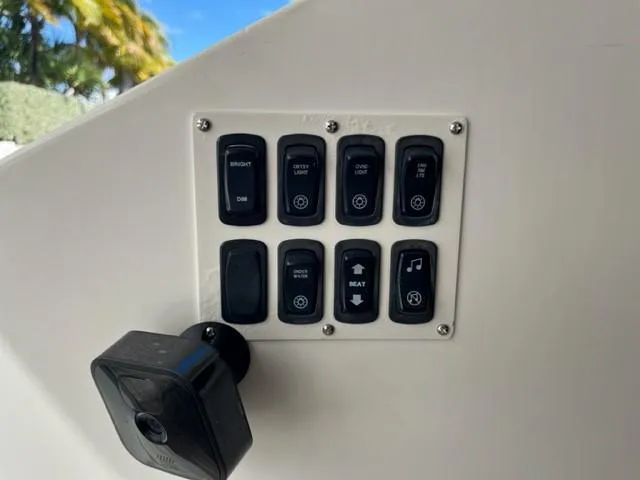  Yacht Photos Pics Control panel of a 2008 Marquis 40 SC yacht with various switches.