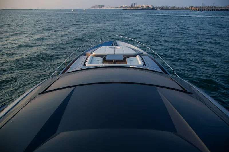  Yacht Photos Pics Luxury 2016 Pershing 82 yacht cruising on open water, showcasing sleek design and elegance.