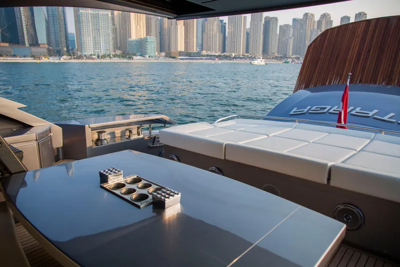  Yacht Photos Pics Luxurious 2016 Pershing 82 yacht with city skyline view in the background.
