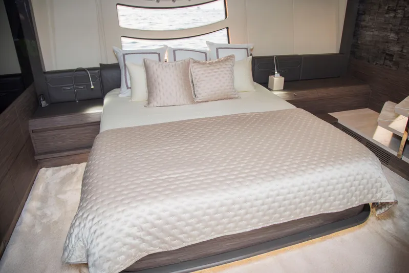  Yacht Photos Pics Luxurious bedroom interior of 2016 Pershing 82 yacht with elegant bedding and modern design.