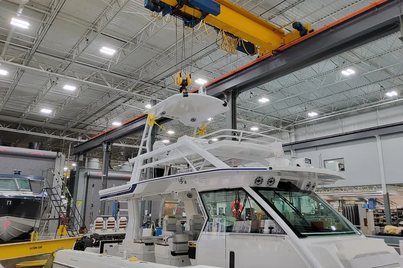  Yacht Photos Pics 2026 Formula 457 Center Console Fish boat in a manufacturing facility.