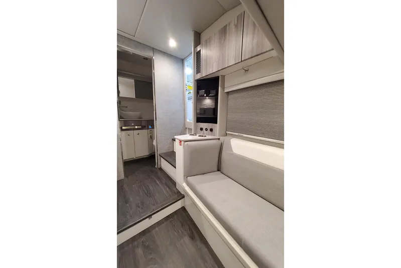  Yacht Photos Pics Interior of 2026 Formula 457 Center Console Fish boat, featuring modern seating and cabinetry.