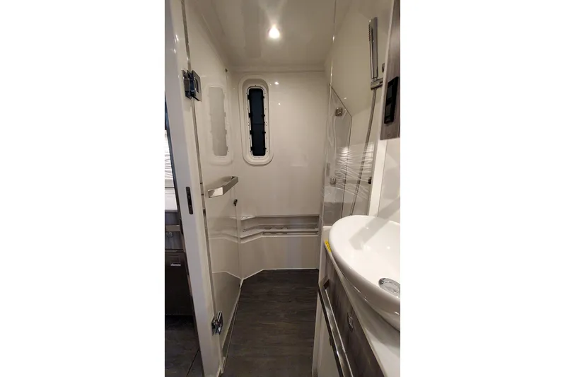  Yacht Photos Pics 2026 Formula 457 Center Console Fish interior bathroom with modern fixtures and sleek design.