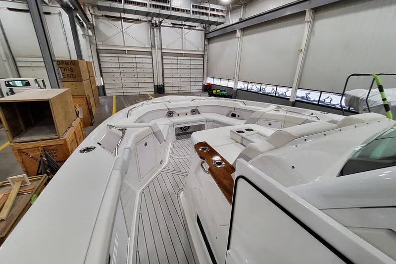  Yacht Photos Pics 2026 Formula 457 Center Console Fish boat interior in a spacious warehouse setting.