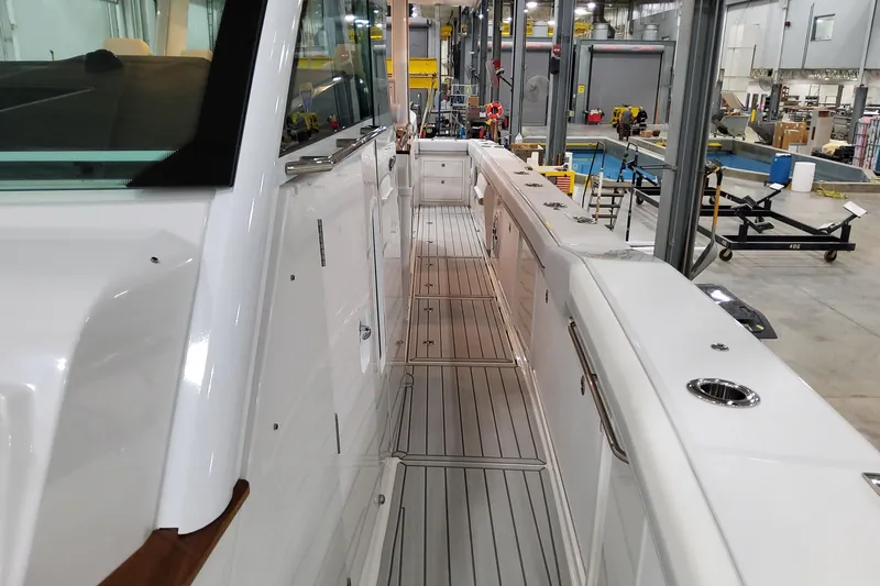  Yacht Photos Pics 2026 Formula 457 Center Console Fish boat interior in a manufacturing facility.