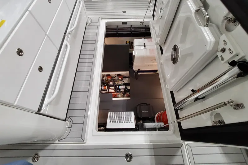  Yacht Photos Pics 2026 Formula 457 Center Console Fish boat interior with open storage compartment.