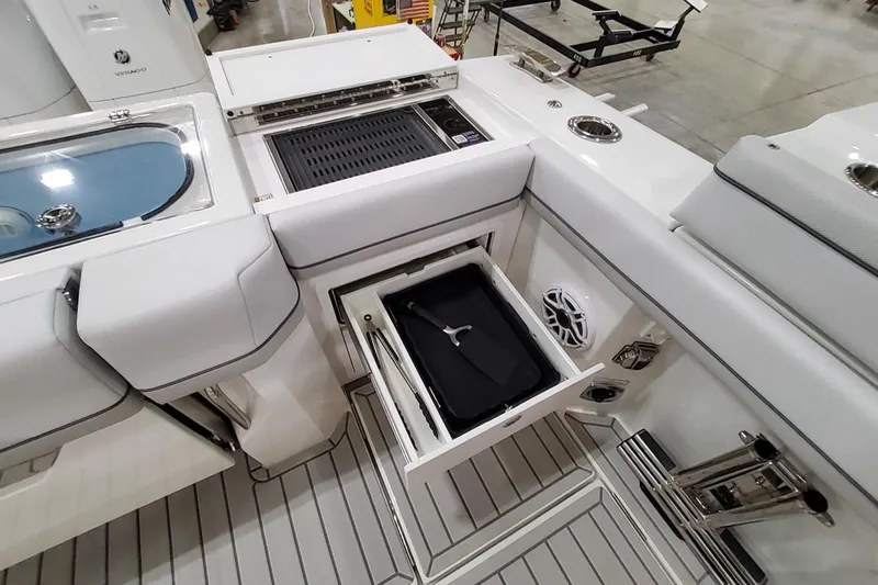  Yacht Photos Pics 2026 Formula 457 Center Console Fish boat interior with storage and grill features.