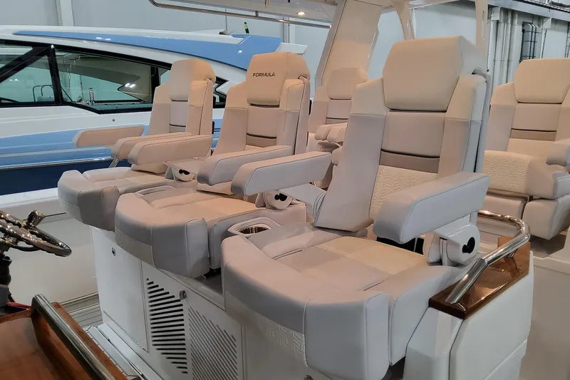  Yacht Photos Pics 2026 Formula 457 Center Console Fish boat with luxurious seating and modern design.