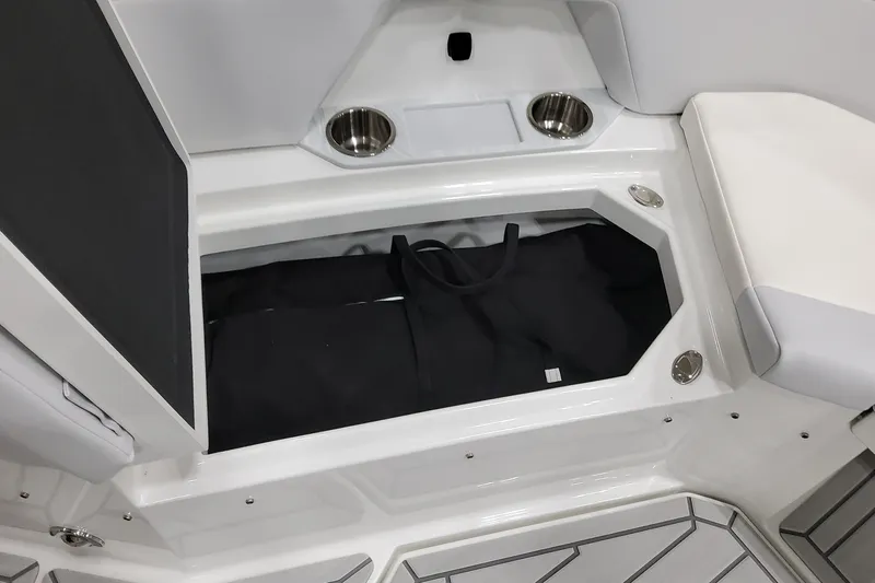  Yacht Photos Pics 2026 Formula 457 Center Console Fish boat storage compartment with cup holders and seating.