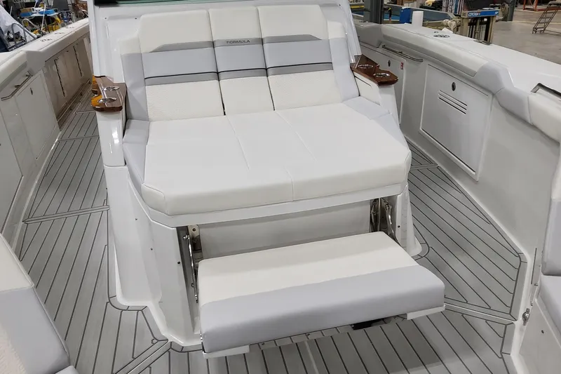  Yacht Photos Pics 2026 Formula 457 Center Console Fish boat with luxurious seating and sleek design.