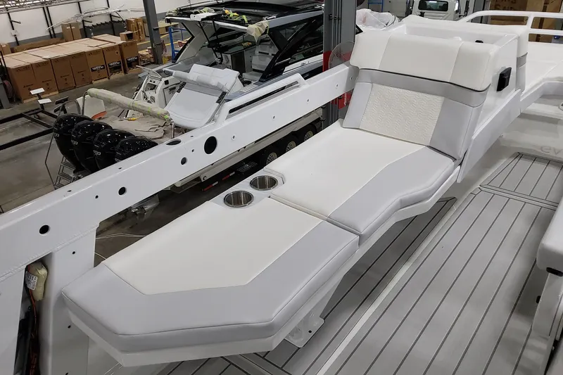  Yacht Photos Pics 2026 Formula 457 Center Console Fish boat interior with white seating and cup holders.