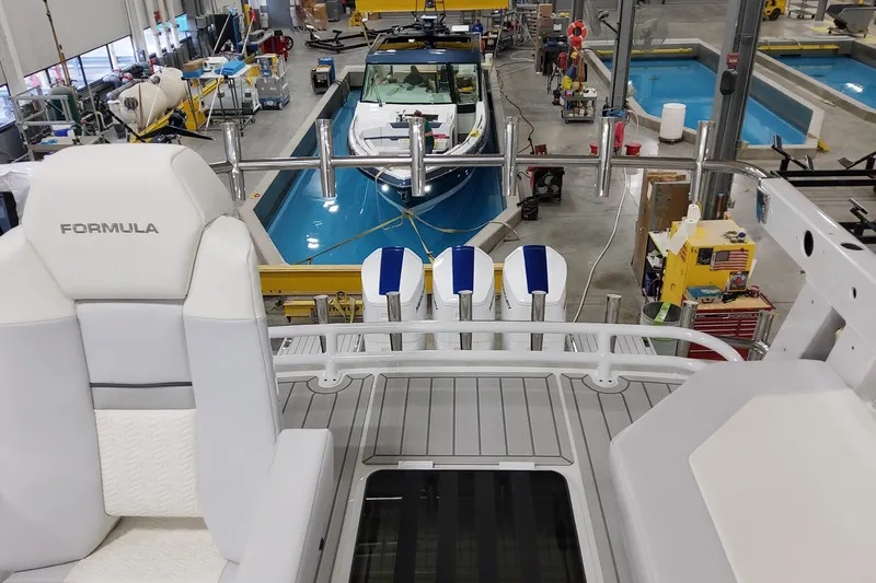  Yacht Photos Pics 2026 Formula 457 Center Console Fish boat in a manufacturing facility.
