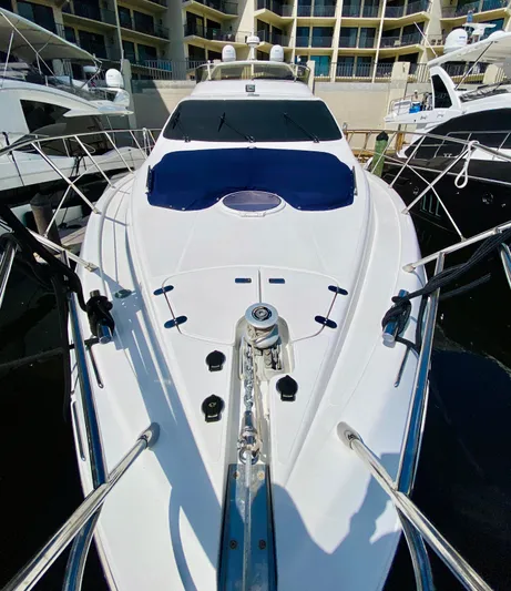 Last Minute Yacht Photos Pics 2002 Azimut 55 yacht docked at marina, sleek white design, luxury vessel.