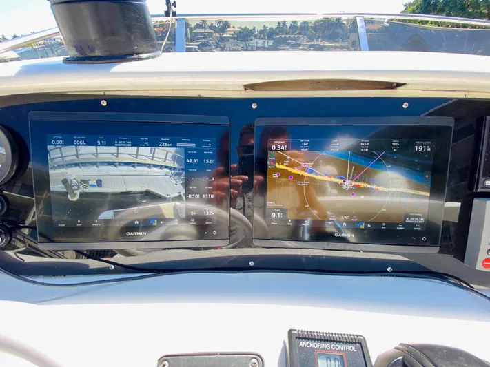 Last Minute Yacht Photos Pics Azimut 55 yacht dashboard with dual Garmin navigation screens, 2002 model.