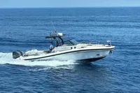2019 Agapi 950 motorboat cruising on open sea, clear blue water, sunny day.